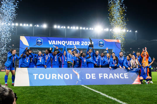 Players of France celebrate with the trophy