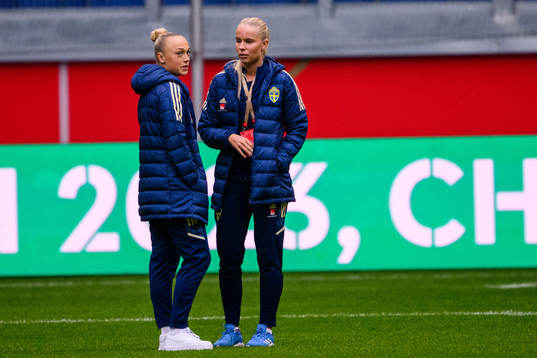 Hanna Bennison and Stina Lennartsson of Sweden walks the