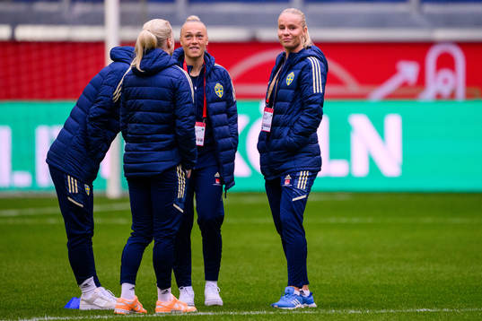 Hanna Bennison and Stina Lennartsson of Sweden walks the