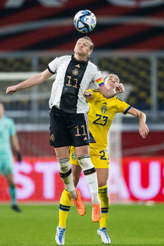 Alexandra Popp of Germany and Elin Rubensson of Sweden