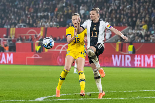 Fridolina Rolfö of Sweden and Alexandra Popp of Germany