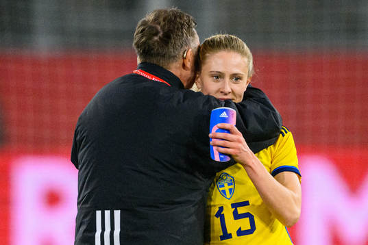 Head coach Peter Gerhardsson hugs Rebecka Blomqvist of