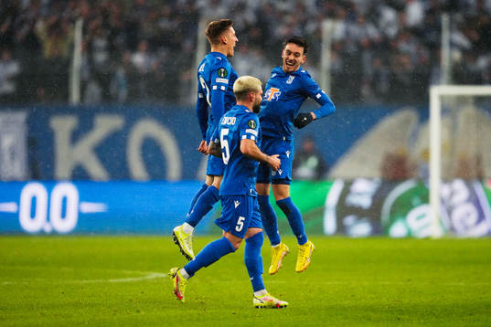 Antonio Milic of Lech Poznan celebrates with teammates