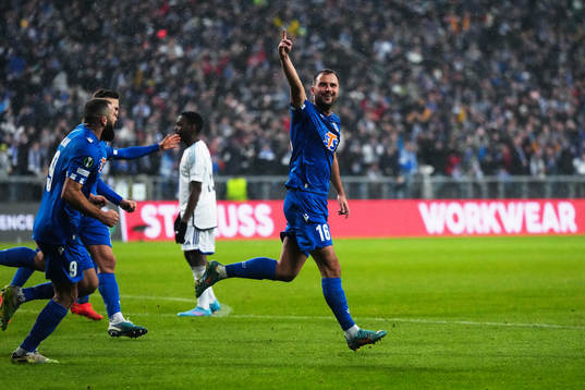 Antonio Milic of Lech Poznan celebrates