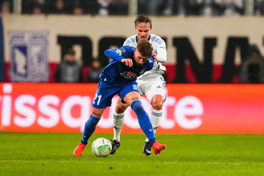 Michal Skoras of Lech Poznan and Pierre Neurath Bengtsson