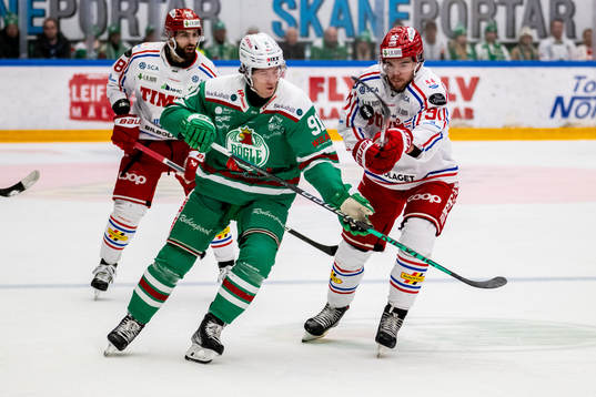 Rögles Adam Tambellini  och Timrås Magnus Pääjärvi