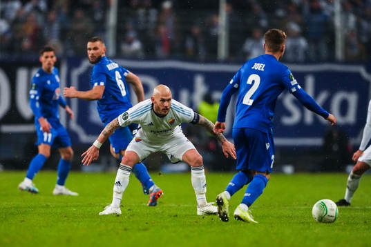 Magnus Eriksson of Djurgården and Joel Pereira of Lech