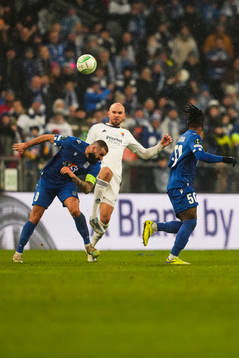 Mikael Ishak of Lech Poznan and Marcus Danielson of