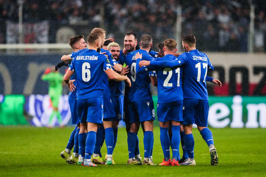 Antonio Milic of Lech Poznan celebrates with teammates