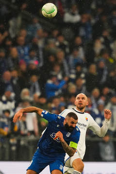 Mikael Ishak of Lech Poznan and Marcus Danielson of