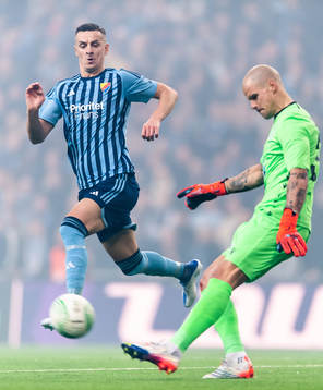 Haris Radetinac of Djurgården and goalkeeper Filip