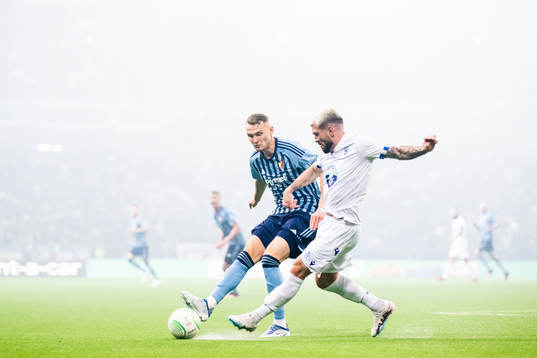 Piotr Johansson of Djurgården and Pedro Rebocho of Lech