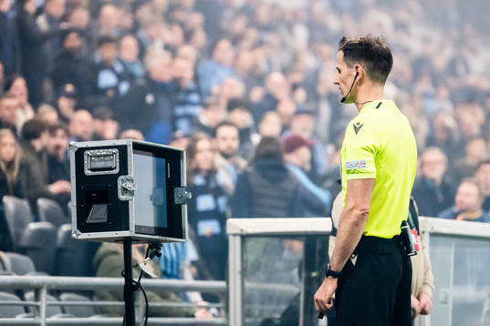 Referee Duje Strukan with a VAR review