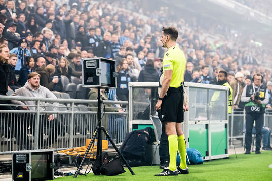 Referee Duje Strukan with a VAR review