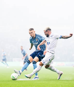 Piotr Johansson of Djurgården and Pedro Rebocho of Lech