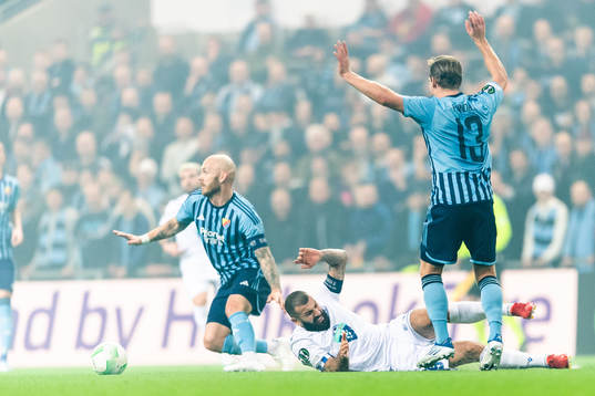 Magnus Eriksson of Djurgården and Mikael Ishak of Lech