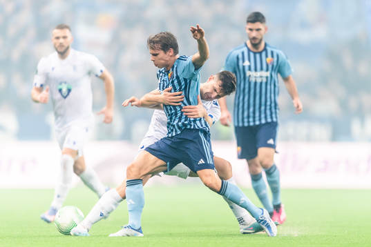Elias Andersson of Djurgården and Filip Szymczak of Lech
