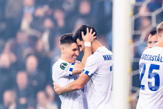 Filip Marchwinski of Lech Poznan celebrate with Joel Pereira