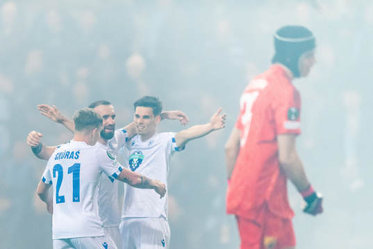 Players of Lech Poznan celebrate the 0-2 goal by Michal