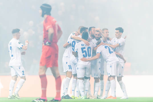 Players of Lech Poznan celebrate the 0-2 goal by Michal