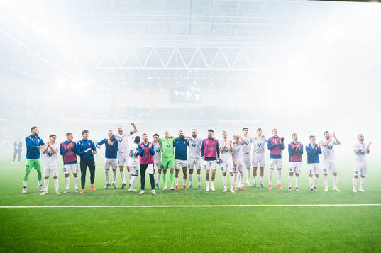Players of Lech Poznan celebrate