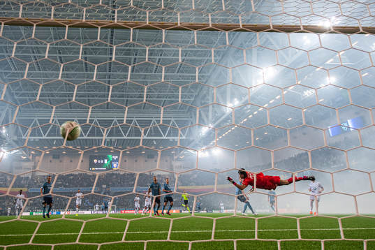 Michal Skoras of Lech Poznan shoots to score past