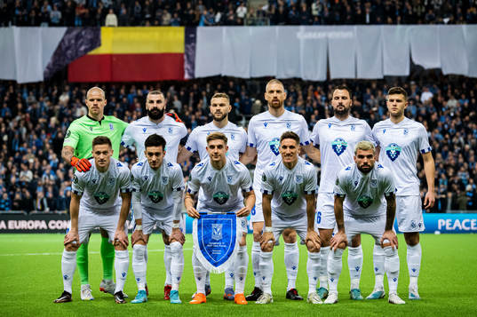 Players of Lech Poznan pose for a team photo