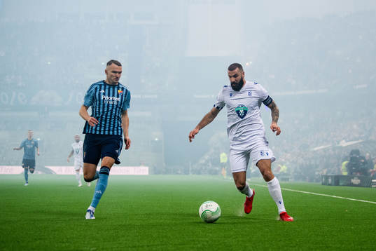 Piotr Johansson of Djurgården and Mikael Ishak of Lech