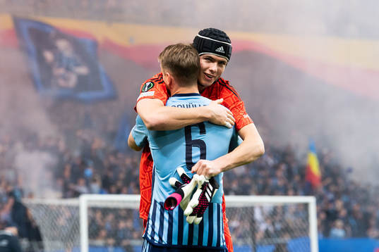 Rasmus Schuller and goalkeeper Jacob Widell Zetterström of