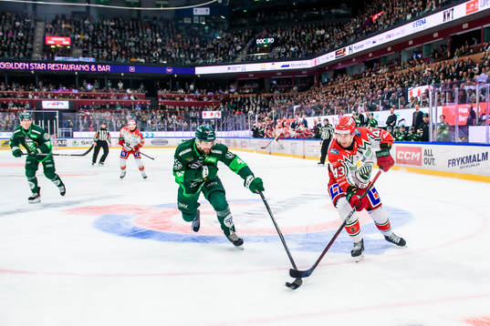 Färjestads Henrik Björklund och Frölundas Tom Nilsson
