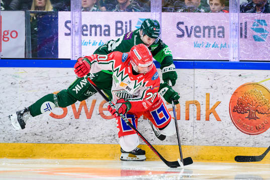 Färjestads Lucas Forsell och Frölundas Joel Lundqvist
