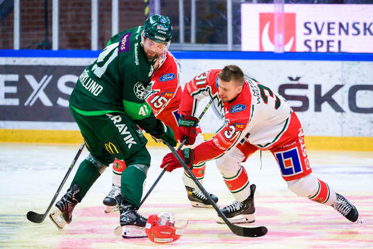 Färjestads Henrik Björklund och Frölundas Nicklas Lasu