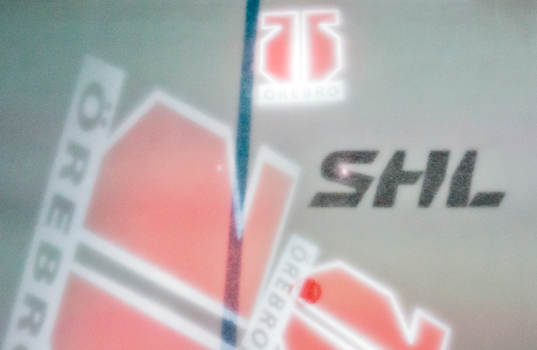 SHL och Örebro logotyper på isen