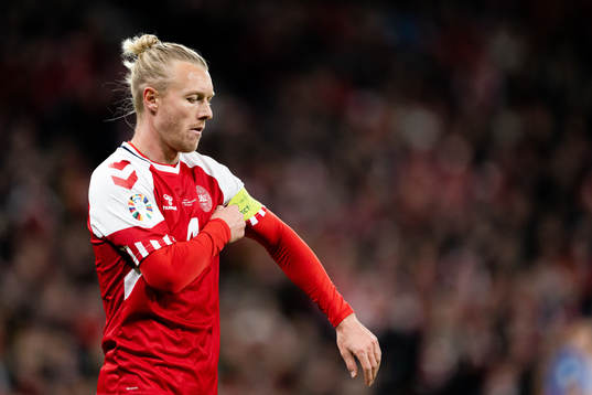 Simon Kjær of Denmark looks dejected