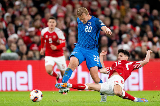 Joel Pohjanpalo of Finland and Christian Nørgaard of