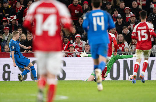 Oliver Antman of Finland scores the 1-1 goal behind