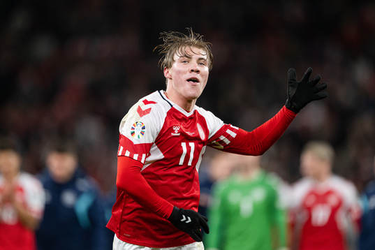 Rasmus Højlund of Denmark celebrates