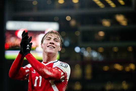 Rasmus Højlund of Denmark celebrates