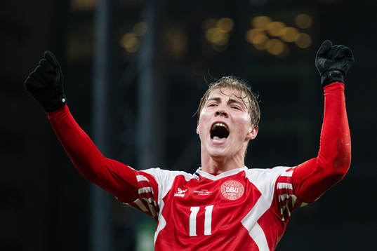 Rasmus Højlund of Denmark celebrates