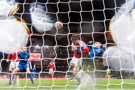 Rasmus Højlund of Denmark scores the 2-1 goal in action