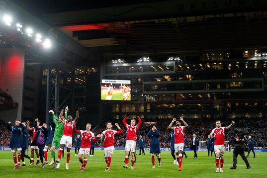 Players of Denmark celebrate