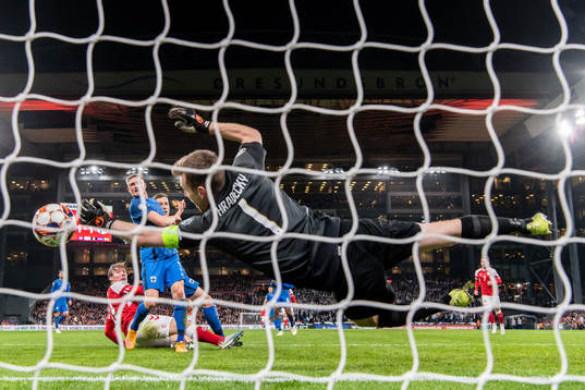Goalkeeper Lukas Hradecky of Finland makes a save against