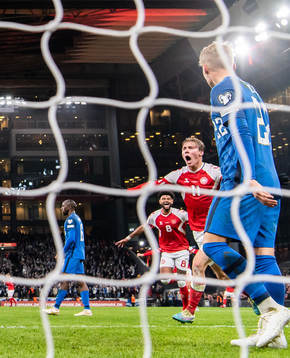 Rasmus Højlund of Denmark celebrates