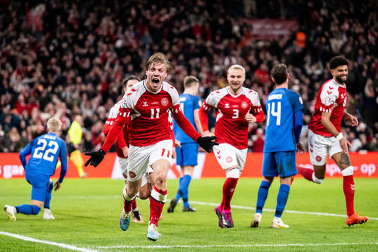 Rasmus Højlund of Denmark celebrates