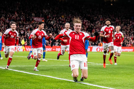 Rasmus Højlund of Denmark celebrates