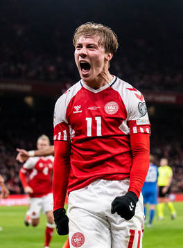 Rasmus Højlund of Denmark celebrates