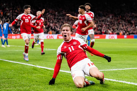 Rasmus Højlund of Denmark celebrates