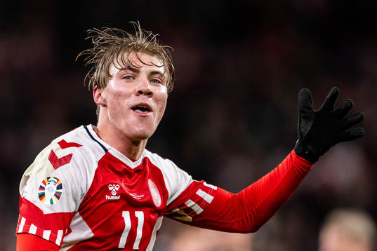 Rasmus Højlund of Denmark celebrates