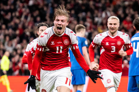 Rasmus Højlund of Denmark celebrates