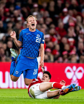 Joel Pohjanpalo of Finland and Christian Nørgaard of